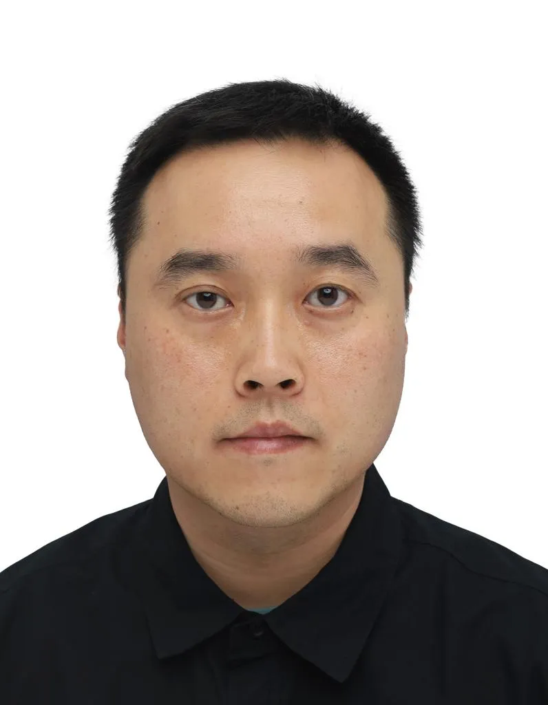 Portrait of Zhouyu Feng, Partner at Zafar Rice Mills.